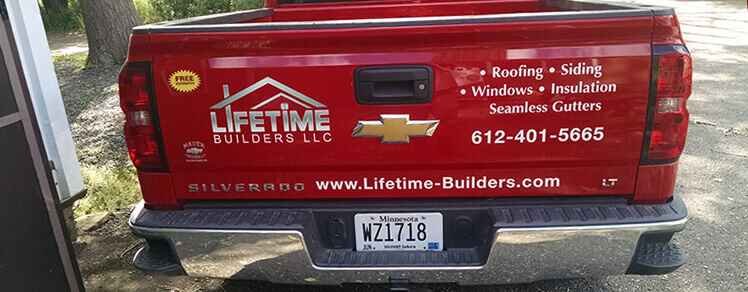 Tailgate vinyl graphics for company trucks