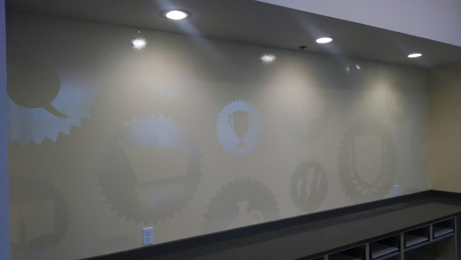Large clear gloss wall graphics installed in an office environment. 